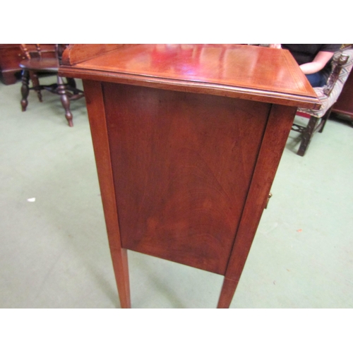 4061 - An Edwardian crossbanded mahogany single door bedside cabinet on square tapering legs, 80cm high x 4... 