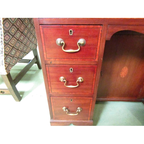 4099 - A 19th Century inlaid mahogany twin pedestal desk of small proportions having seven drawer and kenne... 