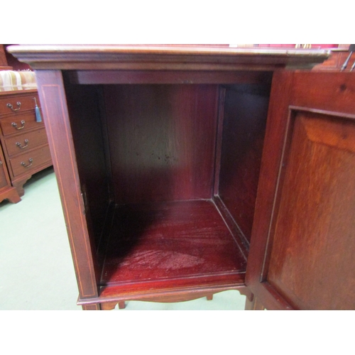 4103 - An Edwardian mahogany line inlaid bedside cabinet the raised back and single door cupboard on square... 