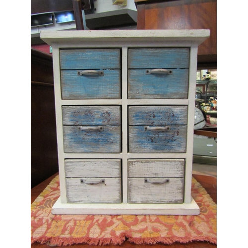 4104 - A rustic bank of six drawers, 36cm x 30cm