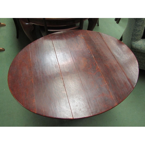 4105 - An 18th Century country oak gate leg table of small proportions the oval top rising leaves on turned... 