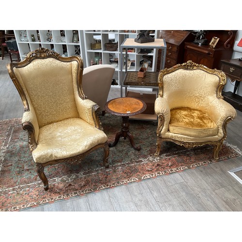 4125 - A pair of French lady's and gent's fireside armchairs, gilded carved wooden frames with scrolls and ... 