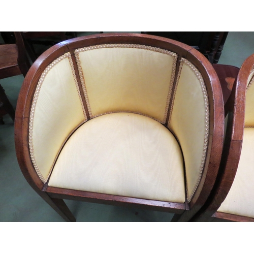 4131 - A pair of Art Deco oak armchairs with silk upholstery over square tapering legs, 81cm high   (R) £90