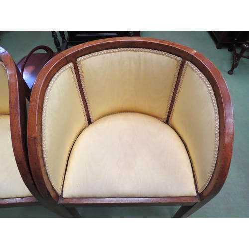 4131 - A pair of Art Deco oak armchairs with silk upholstery over square tapering legs, 81cm high   (R) £90