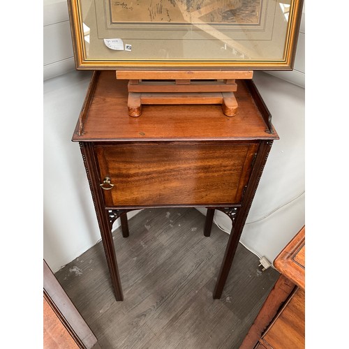 4138 - A 19th Century mahogany single door gentleman's pot-cupboard with 3/4 gallery, Chippendale style, 84... 