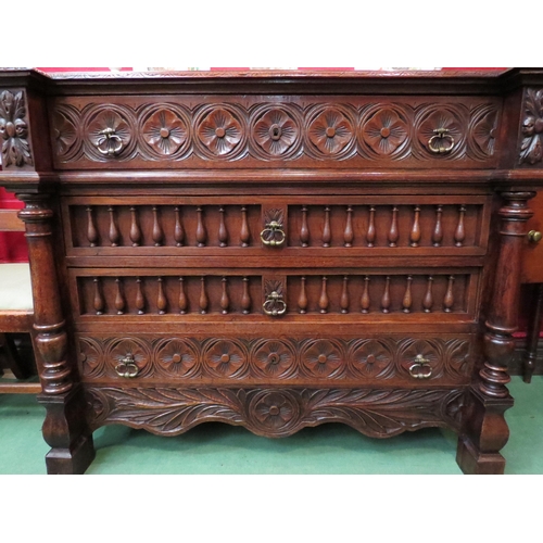 4146 - A 19th Century oak breakfront chest of four drawers having carved and turned decoration with turned ... 