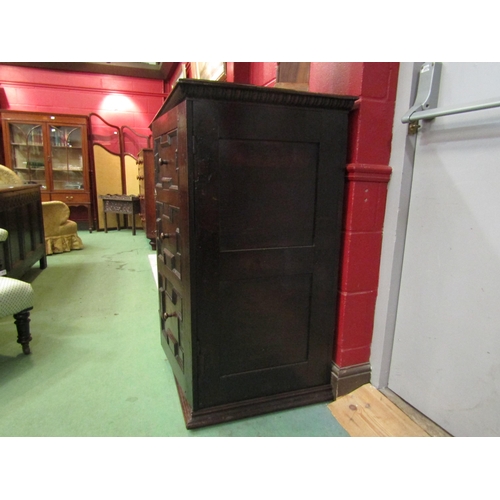 4177 - A 17th Century and later pegged oak two door cupboard with geometric and bobbin turned moulded decor... 