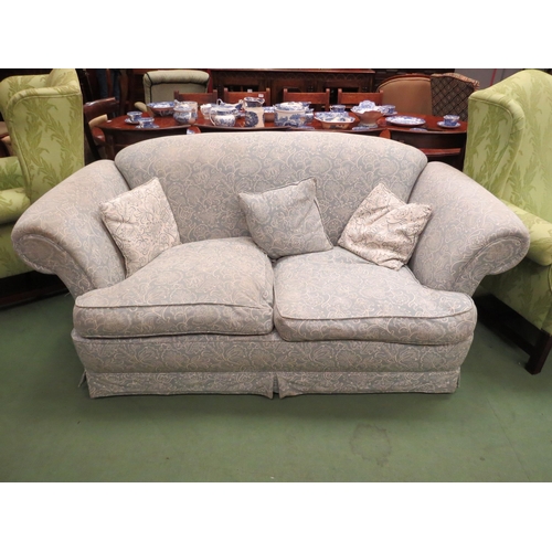 4192 - A Victorian style two seater sofa having light blue patterned upholstery with feather filled cushion... 