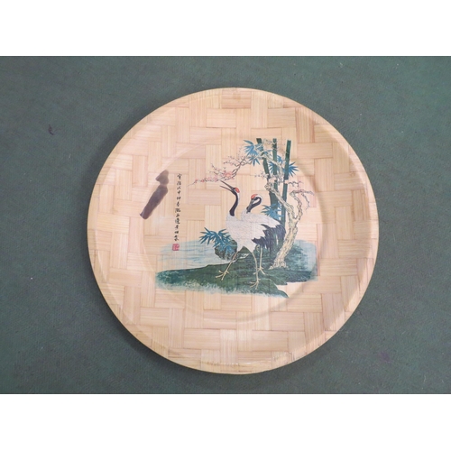 4196 - A bamboo charger painted with Japanese crane and blossom design, 54cm diameter   (C)