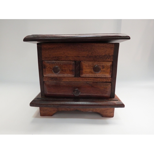 4301 - A small wooden jewellery box with concealed mirror