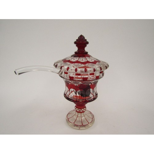 4326 - A ruby and clear glass pedestal jar and cover with ladle, 30cm tall    (R) £150