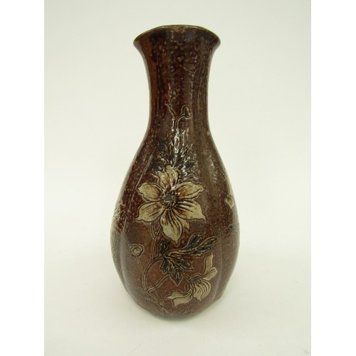 4346 - A Martin Brothers salt glazed vase, floral decoration on a brown ground, some restoration to top rim... 