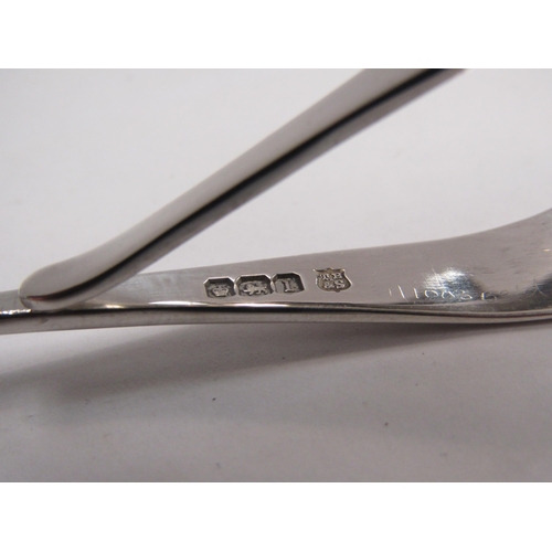 4344 - A cased silver child's feeding spoon and pusher