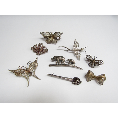 4392 - Eight white metal brooches including butterflies, moths, elephant etc  (R) £20