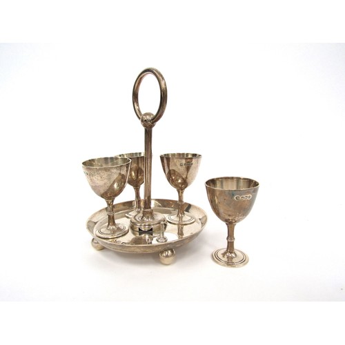 4359 - A William Hutton and Sons silver egg cup stand with four eggcups, Sheffield 1907, 666g    (R) £250