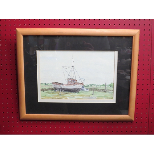 4048 - A watercolour of a boat at Thornham, North Norfolk, signed lower right, framed and glazed, 20cm x 30... 