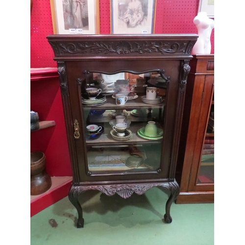 4072 - A mahogany carved mirror backed display cabinet on cabriole legs with ball and claw feet.  No key. 1... 