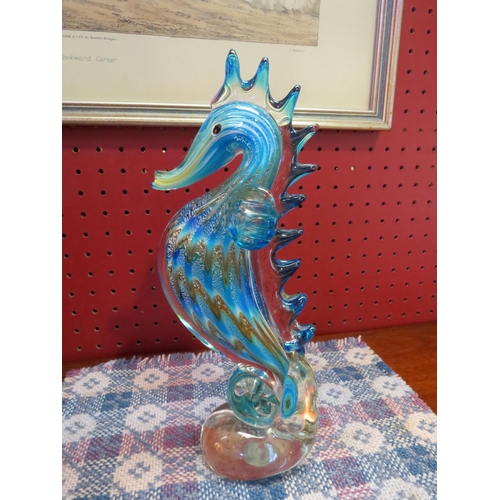 4076 - A glass figure of a seahorse, 25cm tall