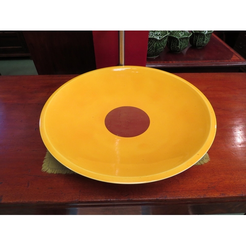 4080 - A Rimmington Vian pottery large circular yellow and gilt dish, signed and dated 1993 to base, 36cm d... 