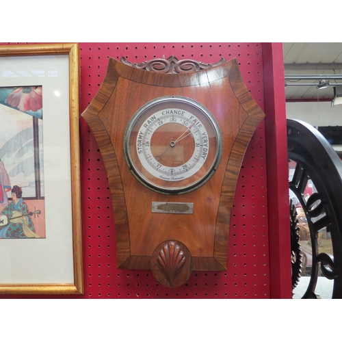 4115 - A 1930's mahogany and walnut Aneroid Barometer with presentation plaque and a German cuckoo clock (2... 