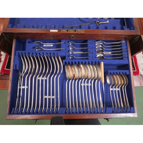 4122 - A large canteen of matched and assorted silver plated cutlery, two interior drawers missing handles