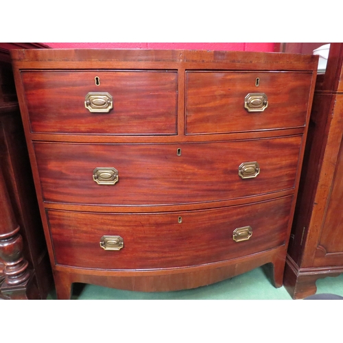 4150 - A 19th Century crossbanded flame mahogany bow-front chest of two short over two long drawers on brac... 