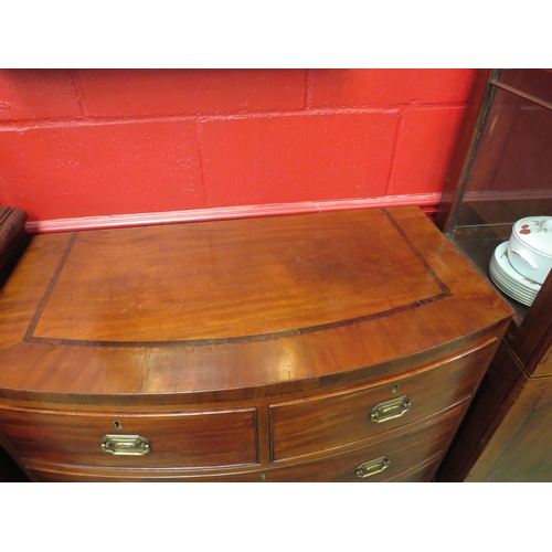 4150 - A 19th Century crossbanded flame mahogany bow-front chest of two short over two long drawers on brac... 