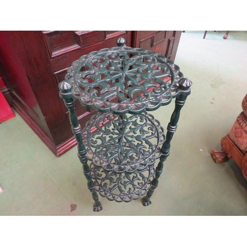 4172 - An ornate green metal three tier stand, 63cm high   (R) £20