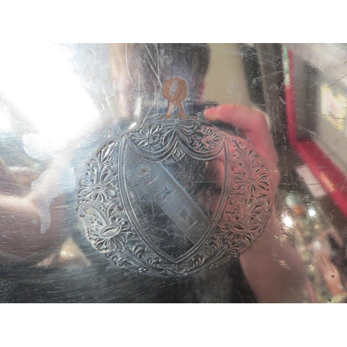 4180 - A silver plated tray with central engraved Spurway of Oakford, Devon, Coat of Arms, 35cm long