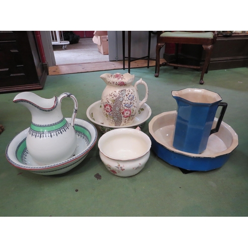 4229 - Three wash jugs and bowls including Cauldon blue glazed and Victorian together with a chamber pot