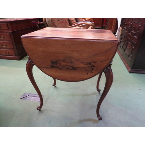 4237 - A walnut sewing table, two drawers over a recessed drawer, two faux drawers, cabriole legs with drop... 