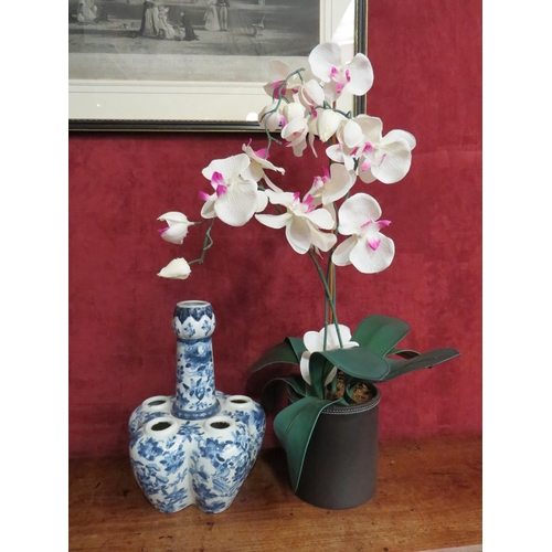 4241 - A blue and white ceramic multi-stem tulip vase together with a faux potted orchid