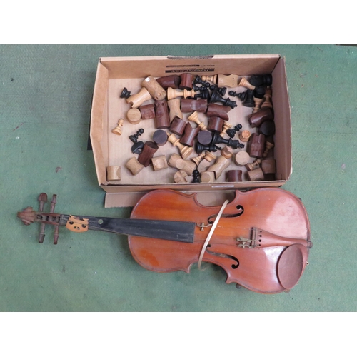 4259 - A violin and treen Chess pieces  (GROUP)