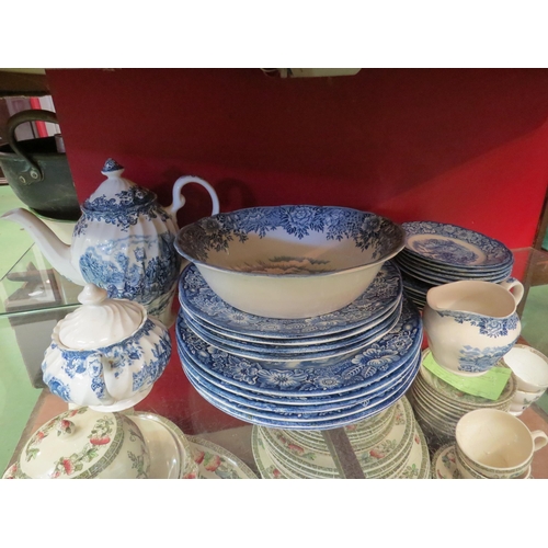 4265 - A selection of blue and white china including bowl, teapot, dinner plates.  Some a/f