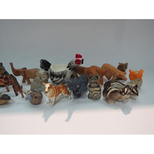 4274 - A selection of ceramic and wooden animals and birds including a Nao Owl, USSR chipmonks, etc