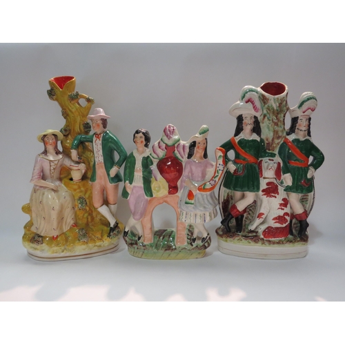 4284 - Three large Staffordshire flatbacks including gent and lady by tree, tallest 31cm  (E)  £20-30