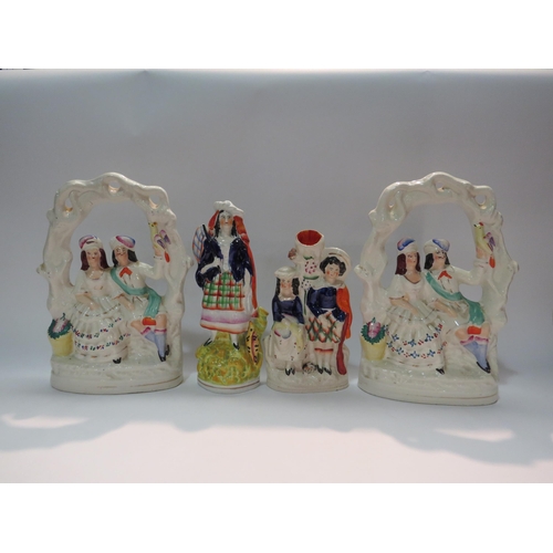 4287 - A pair of Staffordshire flatbacks of couples seated, Staffordshire figure and another (4)  (E)  £15-... 