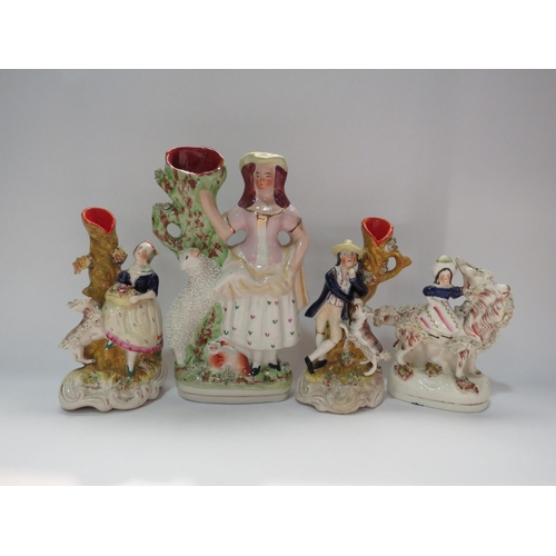 4289 - A pair of Staffordshire flatbacks of gent and lady by tree together with two others