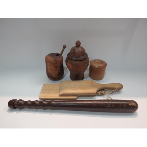 4312 - A selection of treen including a truncheon with turned handle, lidded pots, butter pats