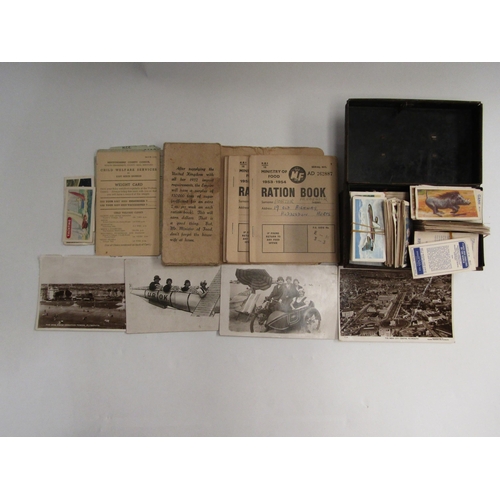 4354 - Motor Car fuel ration book, ration book holder with contents and four postcards and a tin of cigaret... 