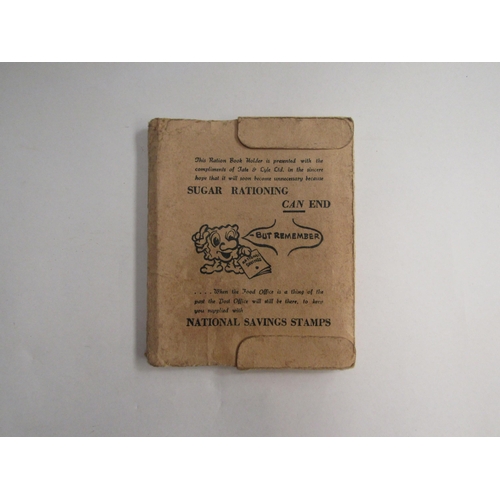 4354 - Motor Car fuel ration book, ration book holder with contents and four postcards and a tin of cigaret... 