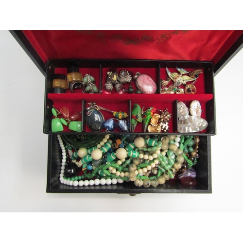 4439 - A jewellery box with contents including bead necklaces, earrings, bangle, etc and another empty jewe... 