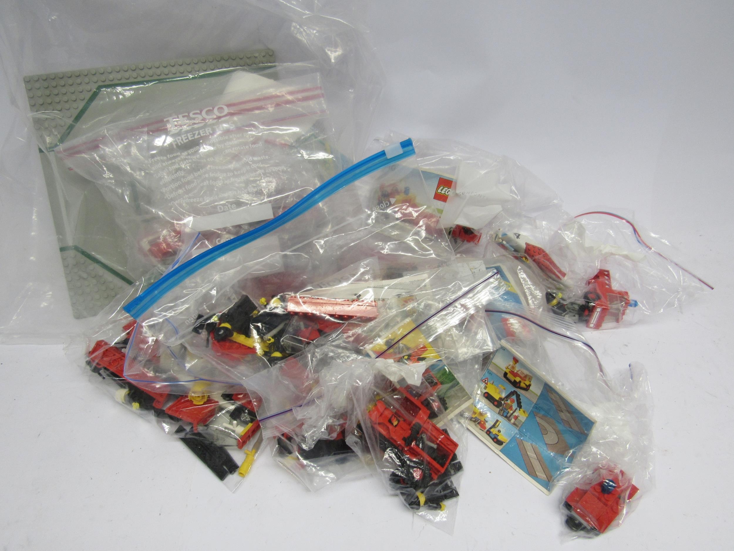 A collection of unboxed Lego sets, with instructions; 6382 Fire