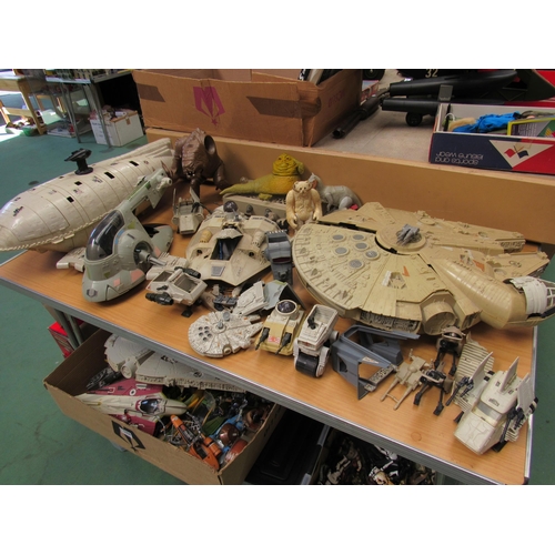 A collection of loose and playworn vintage Star Wars vehicles