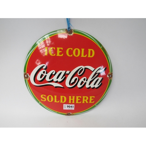 9041 - A circular enamel sign; 'Ice Cold Coca-Cola Sold Here'