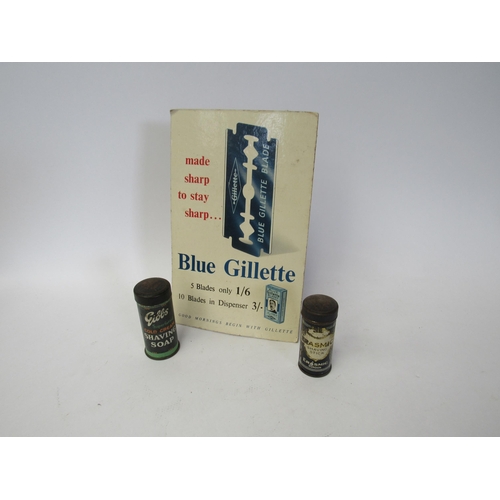 9127 - A Blue Gillette easel backed advertising shop card and two shaving stick tins including Gibbs