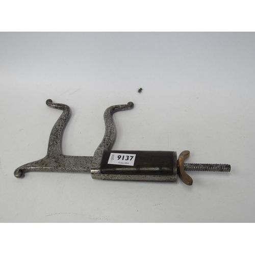 9137 - A mahogany handled horse mouth gag
