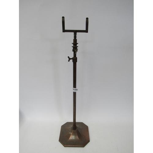 9160 - A mid 20th Century brass adjustable shop stand