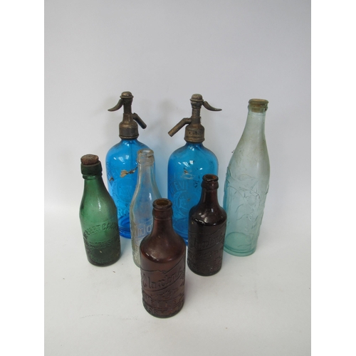 9162 - A box of mixed glass bottles and blue glass soda syphon