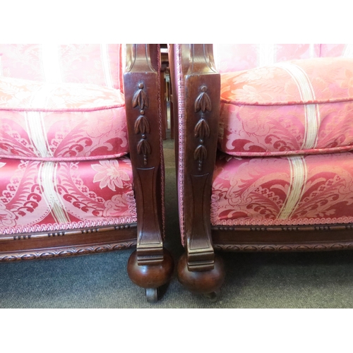 1012 - A pair of Arts & Crafts mahogany Bergere armchairs with carved armrest and feather filled cushions, ... 